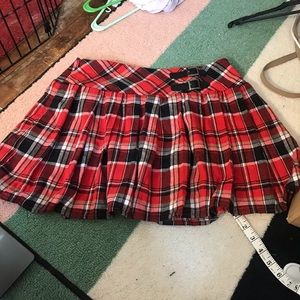 Red and black plaid skirt with buckle detail